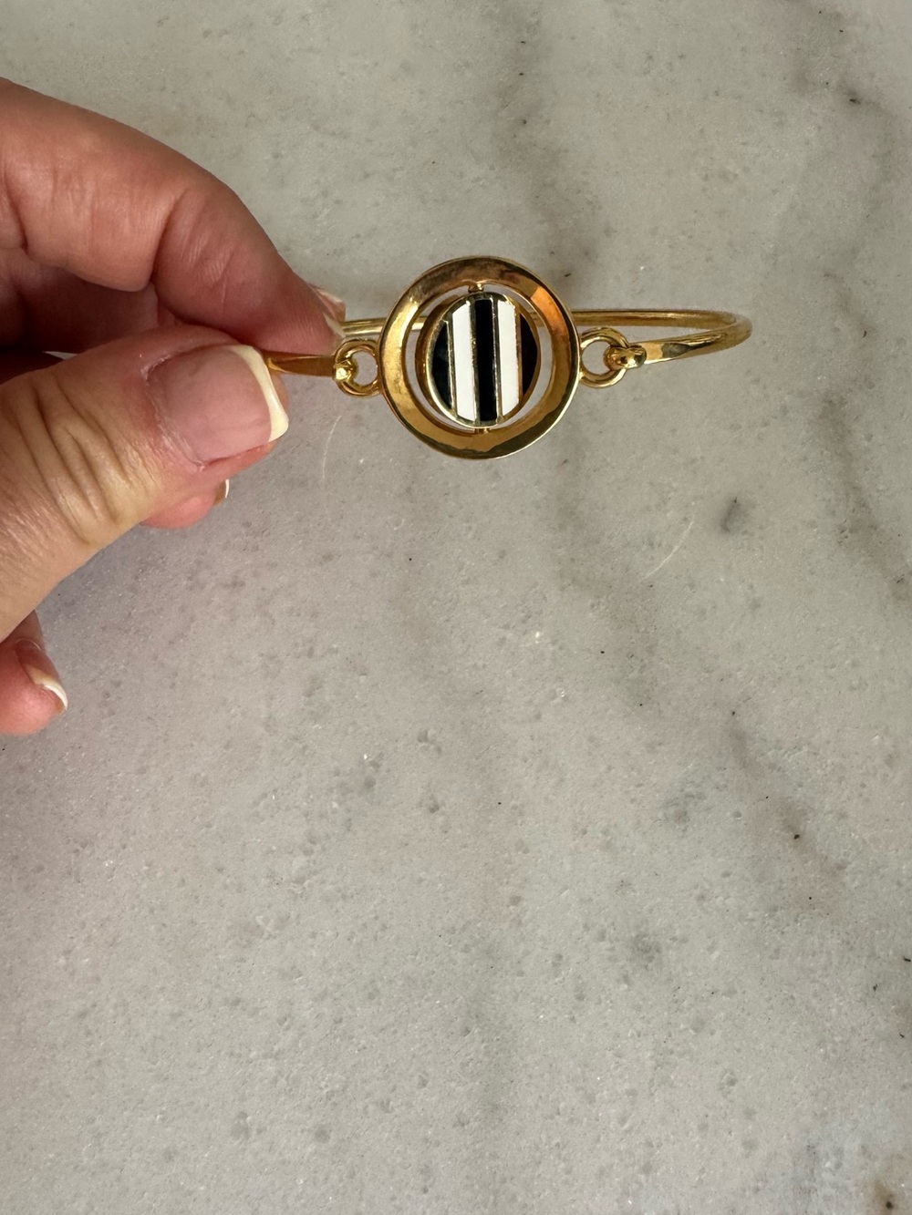 Gold-Tone Bangle Bracelet with Black and White Enamel Accent